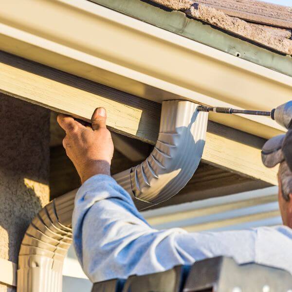 Downpipe repair in progress on Western Sydney home by Sydney Gutter Guys