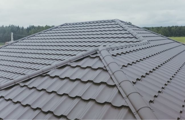 Freshly painted tiled roof in Sydney after professional roof painting by Sydney Gutter Guys Freshly painted tiled roof in Sydney after professional roof painting by Sydney Gutter Guys