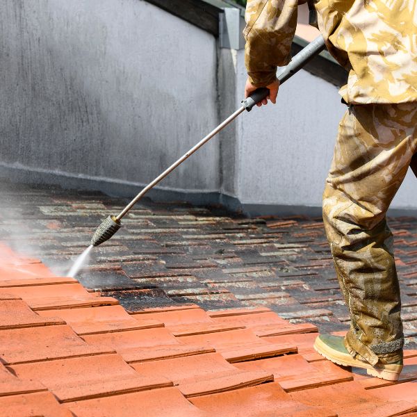 Pressure washing as part of full roof restoration in Western Sydney by Sydney Gutter Guys