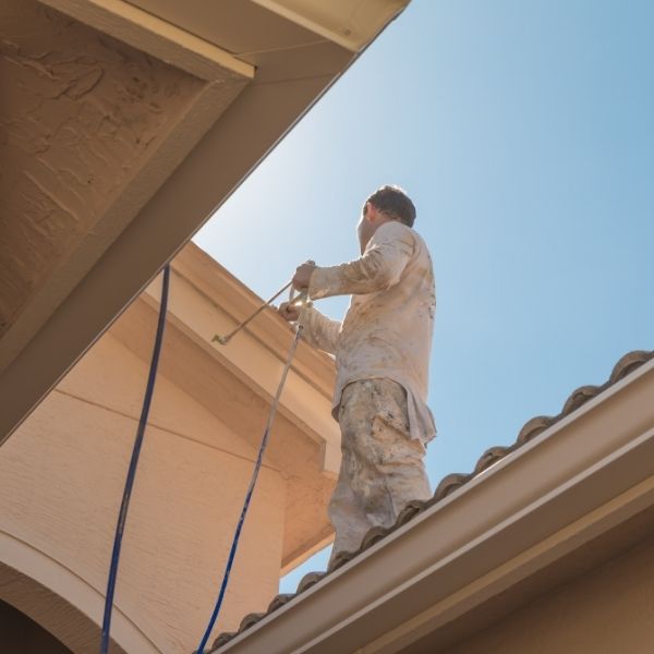 Professional roof painter in Sydney carrying out roof painting service by Sydney Gutter Guys Professional roof painter in Sydney carrying out roof painting service by Sydney Gutter Guys