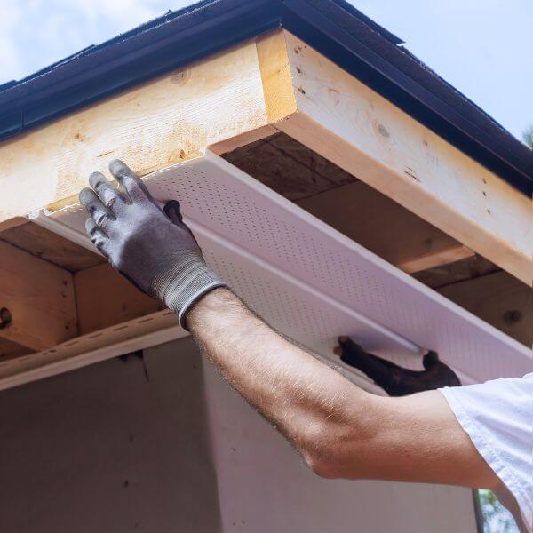 Roof fascia repair in Western Sydney in progress, restoring damaged timber fascia boards along a residential roofline.
