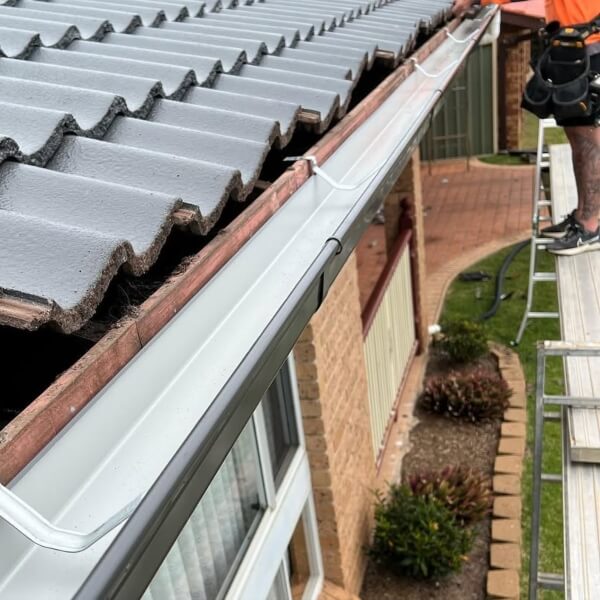 Gutter installation on a tiled roof in Western Sydney completed by Sydney Gutter Guys.